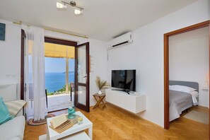 1 habitación, tabla de planchar con plancha, wifi gratis y ropa de cama 