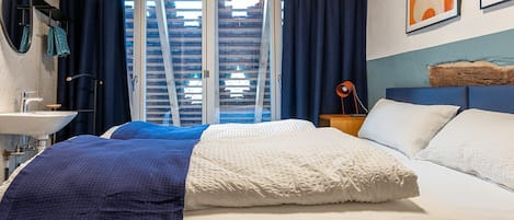 Chambre Standard Double ou avec lits jumeaux | Lit parapluie, Wi-Fi gratuit