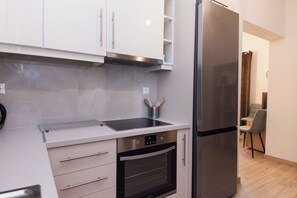Apartment | Private kitchen | Full-sized fridge, oven, toaster, cookware/dishes/utensils - Urban Chic 2BR Experience in Galatsi (Galatsi)