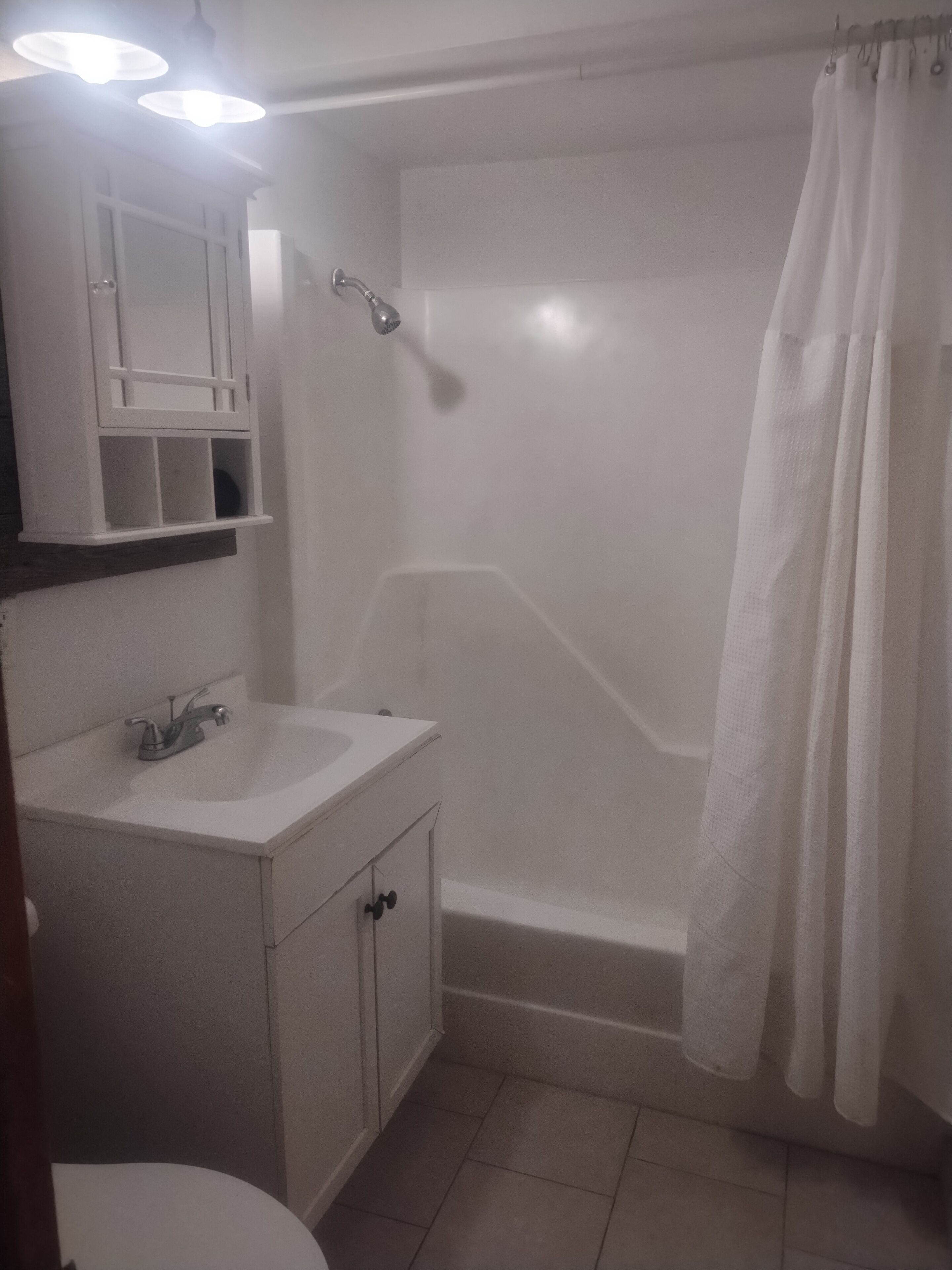 Secador de pelo y toallas