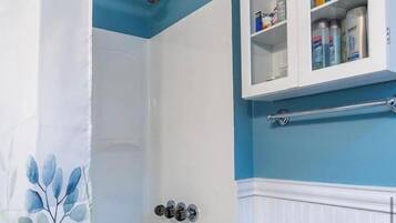 Hair dryer, towels, soap, shampoo