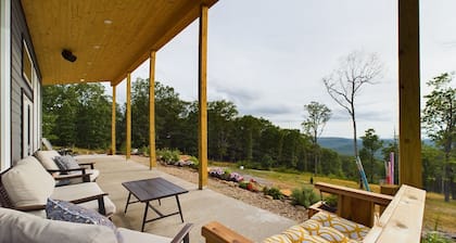 Beautiful modern cabin on top of the mountain with stunning sunset views.