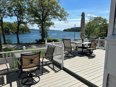 Enjoy spectacular views of Lobster Cove. Large yard, EV charger & dog friendly.