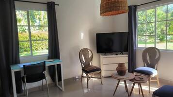 Club Apartment, Multiple Beds, Garden Area | Living area | Smart TV, Netflix, streaming services