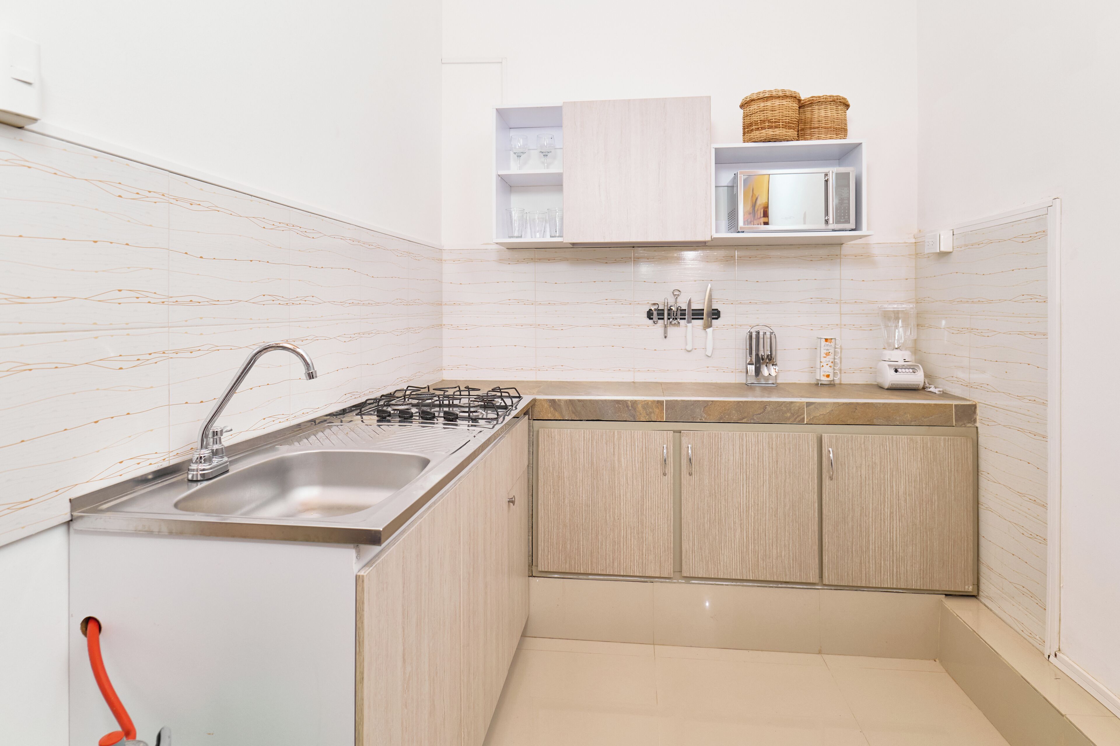 Executive Apartment, Multiple Beds, Garden Area | Private kitchen | Full-sized fridge, microwave, blender, cookware/dishes/utensils