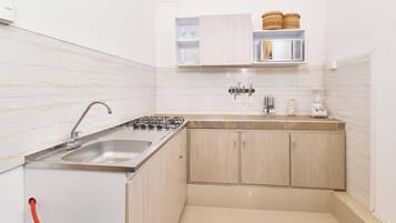 Executive Apartment, Multiple Beds, Garden Area | Private kitchen | Full-size fridge, microwave, blender, cookware/dishes/utensils