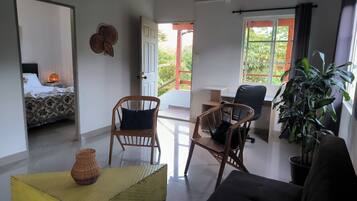 Executive Apartment, Multiple Beds, Garden Area | Living area | Smart TV, Netflix, streaming services