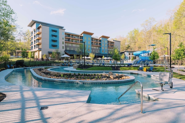 Indoor pool, seasonal outdoor pool, pool umbrellas, pool loungers