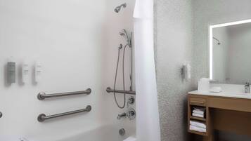 Studio Suite, 1 King Bed, Accessible, Bathtub | Bathroom | Hair dryer, towels, soap, shampoo