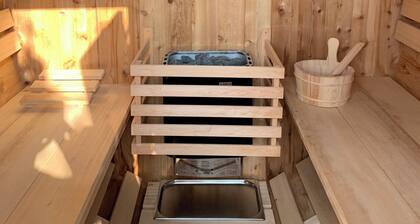 Maison de pécheur avec sauna extérieur en bois