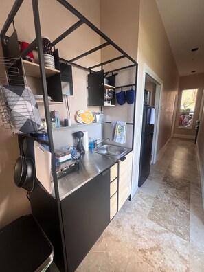 Fridge, microwave, coffee/tea maker, high chair