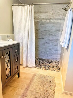 Shower, towels, soap, shampoo