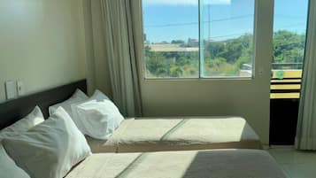 Quarto triplo conforto | Wi-Fi de cortesia, roupa de cama