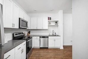 Fridge, microwave, oven, dishwasher - CozySuites Historic 2BR Downtown Indy  (Indianapolis)