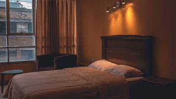 Premium bedding, down comforters, desk, laptop workspace