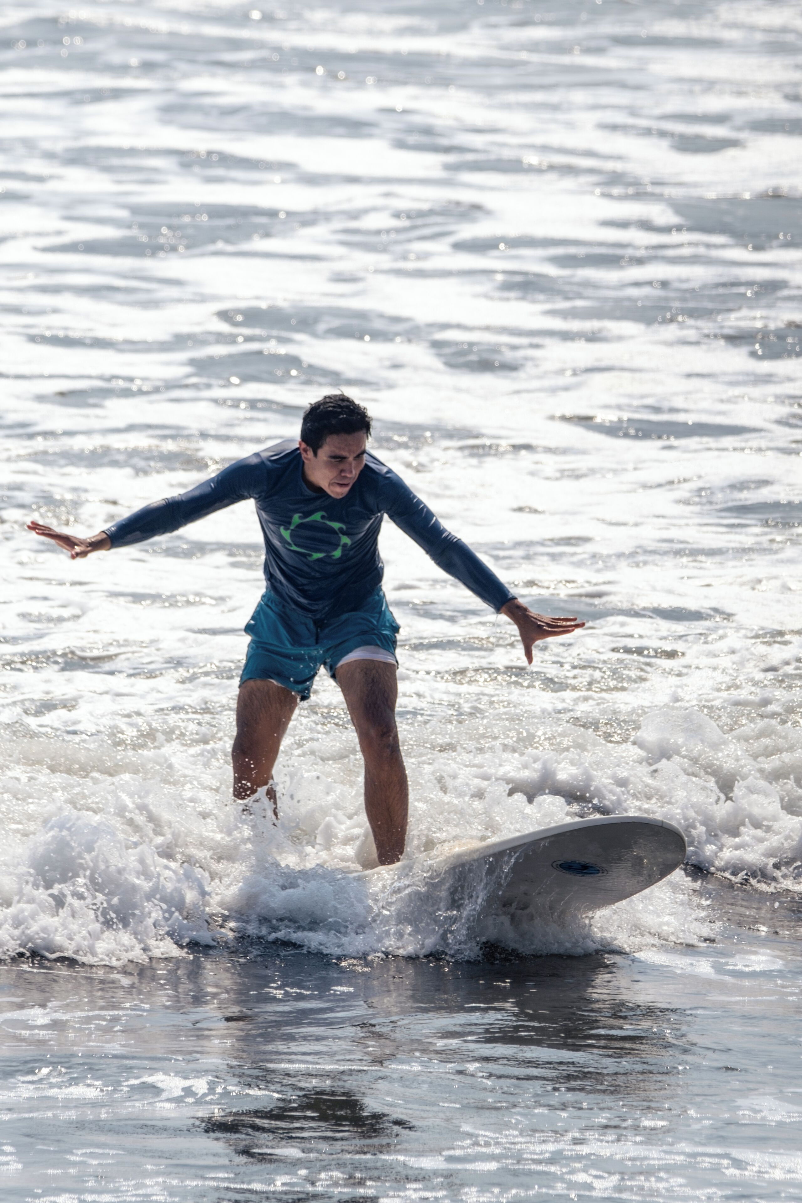 A person surfing on a wave.