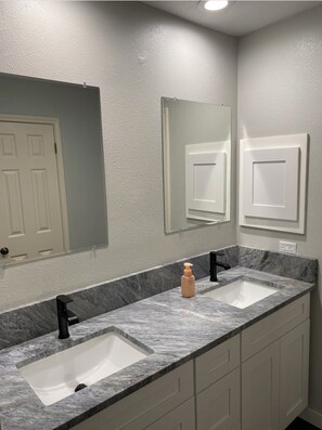 Hair dryer, towels, soap, toilet paper