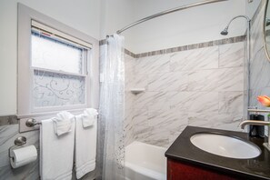 Hair dryer, towels, soap, shampoo