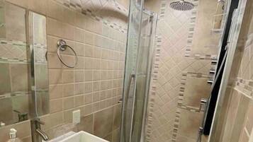 Shower, towels, soap, shampoo