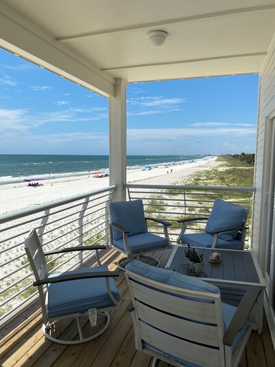 Closest to the sand and surf and no better view than Water’s Edge in the sand