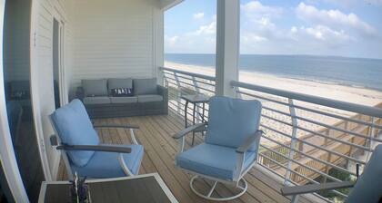 Closest to the sand and surf and no better view than Water’s Edge in the sand
