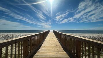 On the beach, sun loungers, beach towels