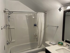 Hair dryer, towels, soap, toilet paper