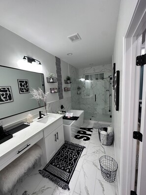 Hair dryer, towels, soap, shampoo