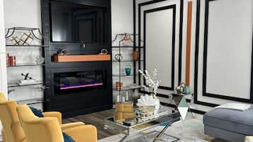 Smart TV, fireplace, books