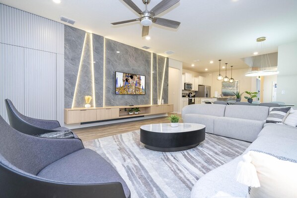 Téléviseur connecté, jeux vidéo, table de baby-foot, table de ping-pong