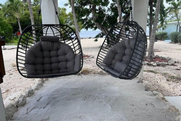 Calming Ocean waves and lush sand make this the perfect hang out!