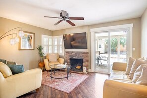 Smart TV, fireplace, foosball, books