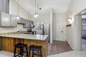 Fridge, microwave, stovetop, dishwasher - Cozy Winter Park Condo: Bike, Ski, & Hike! (Winter Park)
