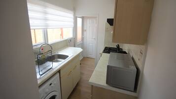 Fridge, oven, electric kettle, toaster