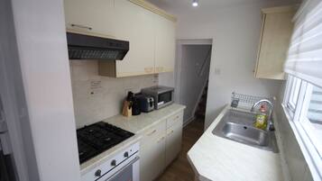 Fridge, oven, electric kettle, toaster