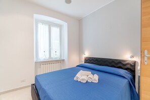 1 habitación, tabla de planchar con plancha, internet y ropa de cama 