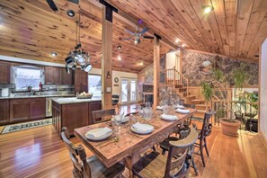 Rustic modern dining farm table chef kitchen waterfront nature.