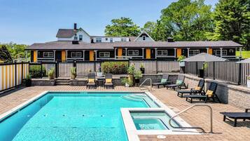 Seasonal outdoor pool, open 7:30 AM to 9:00 PM, pool umbrellas