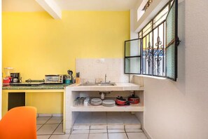 Fridge, oven, coffee/tea maker, toaster