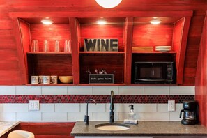 Microwave, coffee/tea maker, cookware/dishes/utensils