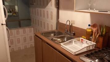 Departamento ejecutivo | Cocina privada | Refrigerador con congelador, microondas, periquera y licuadora