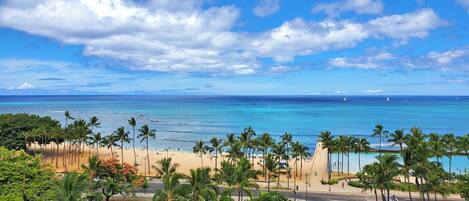 On the beach, sun-loungers, beach towels
