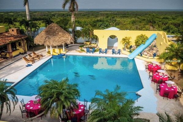 2 outdoor pools, pool umbrellas, pool loungers