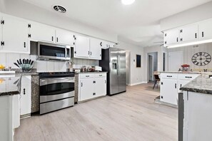 Fridge, oven, coffee/tea maker, toaster