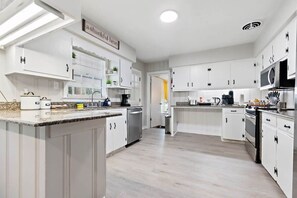 Fridge, oven, coffee/tea maker, toaster