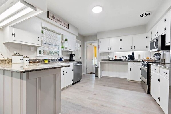 Fridge, oven, coffee/tea maker, toaster