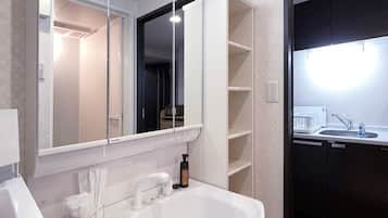 Bathtub, hair dryer, towels
