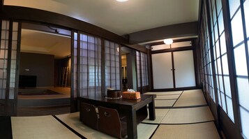 Traditional Suite | Living area | 55-inch Smart TV with digital channels