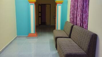 Deluxe Double Room | Living area | TV