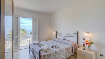 Family Apartment, Multiple Bedrooms, 2 Bathrooms (Palms Villa - Sea View) | 2 bedrooms, free WiFi, bed sheets